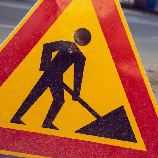 Foto bord werken aan de weg
